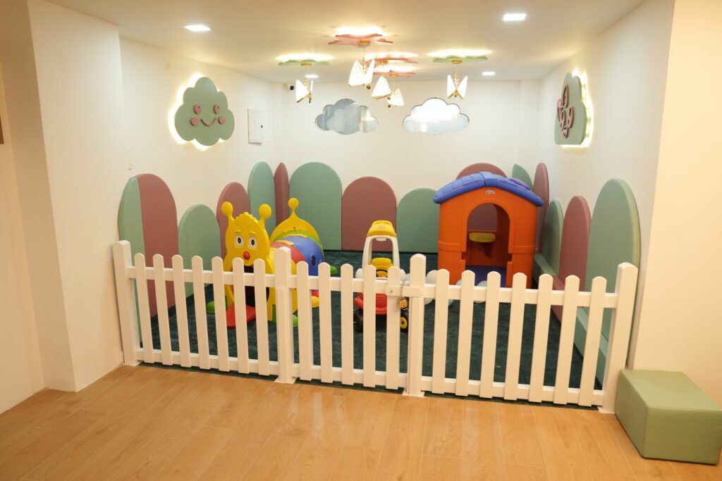 “Indoor play area for children at Jewel Child Development Centre in Kochi, the best occupational therapy center and best autism centre in Kerala. The safe and engaging environment is designed for skill-building activities that support child development through occupational therapy, speech therapy, behavior therapy, sensory integration, physiotherapy, play therapy, clinical psychology, special education, and developmental pediatrics. Recognized as the best autism treatment center in Kerala, Jewel Autism Centre provides expert care under Dr. Jameson Samuel and Dr. Jency Blesson, trusted as the best autism doctors in India and Dubai, UAE.”